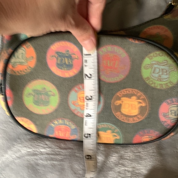 Authentic Dooney and Bourke wax coated handbag with adjustable leather strap - Picture 12 of 16